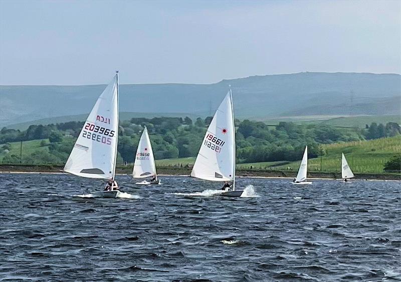 Lasers at speed at Hollingworth Lake photo copyright Rhiann Bramwell taken at Hollingworth Lake Sailing Club and featuring the ILCA 7 class