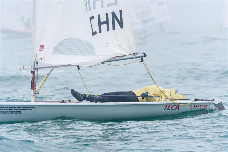 Still no wind on day 4 of the ILCA 7 Men's World Championships at Qingdao photo copyright Kong XiangJing / ILCA taken at Qingdao Olympic Sailing Center and featuring the ILCA 7 class