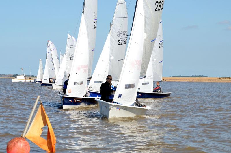 Lining up for the start during the Crewsaver Millennium Series 5 at Snettisham Beach photo copyright Peter Hutchinson taken at Snettisham Beach Sailing Club and featuring the 2000 class