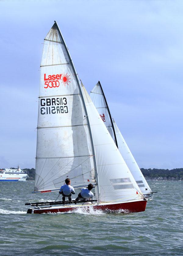 Laser 5000s at Poole photo copyright Mike Millard taken at Poole Yacht Club and featuring the Laser 5000 class