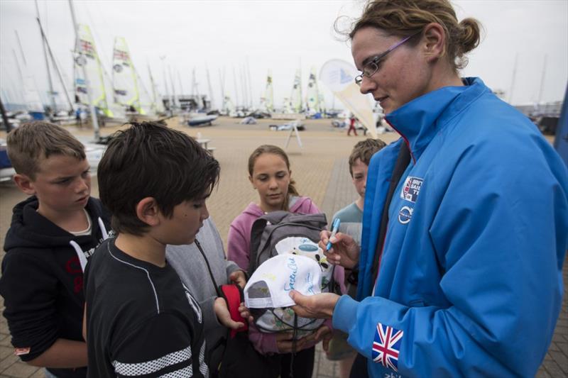 Ali Young (Laser Radial) signs autographs for schoolchildren on day 3 of ISAF Sailing World Cup Weymouth - photo © onEdition