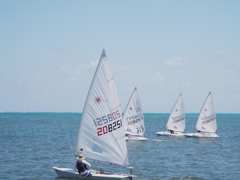 Challenges for the lead (l-r) (208251)Ted, Hanne's brother, (208247) Hanne, (208250) Everall Dixon, (208254) Sarah White photo copyright Belize Sailing Center taken at Belize Sailing Association and featuring the ILCA 6 class