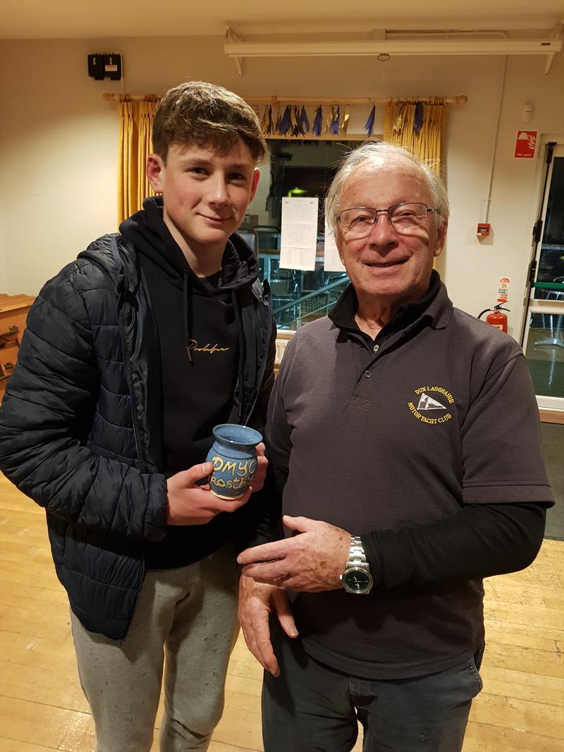 Dun Laoghaire Frostbite Series day 4: Laser Radial mug winner Conor Gorman with DMYC Commodore Frank Guilfoyle photo copyright Frank Miller taken at Dun Laoghaire Motor Yacht Club and featuring the ILCA 6 class