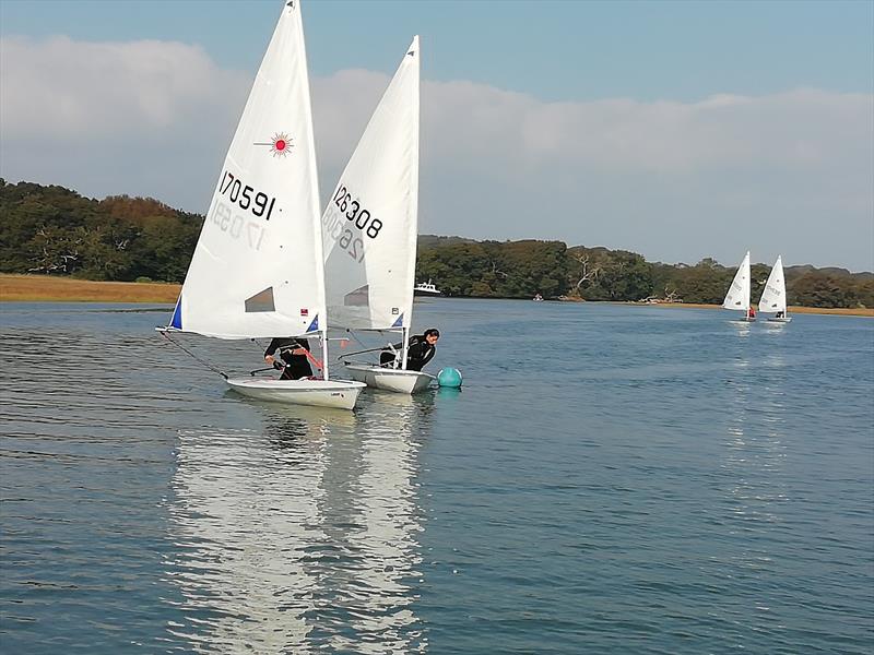 Lasers at 'H' Buoy during the the Isle of Wight Youth and Junior Championships at Yarmouth photo copyright Rob Selby taken at Yarmouth Sailing Club and featuring the ILCA 6 class