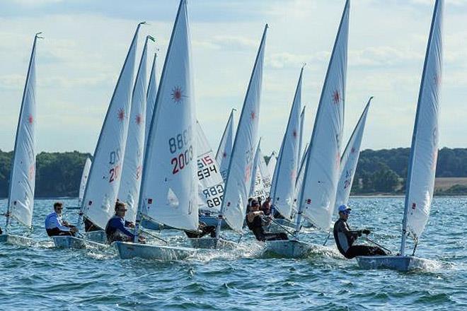 Tight qualification races in the Young Sailors' Laser Radial fleet - Laser Radial Youth World Championships 2018 photo copyright Laser Radial Youth World Championships taken at Kieler Yacht Club and featuring the ILCA 6 class