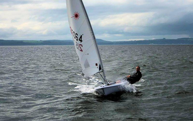 Jon Emmett wins the first race of the Laser UK National Championships at Largs photo copyright Tony Woods taken at Largs Sailing Club and featuring the ILCA 6 class