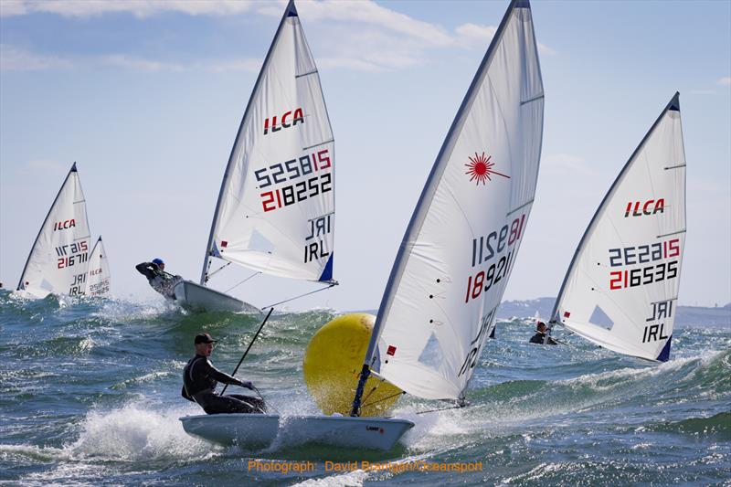 189211 Jonathan O'Shaughnessy (Royal Cork Yacht Club) competing in the ICLA 6 class in big wave action during the Irish Sailing Youth Nationals 2022 photo copyright David Branigan / Oceansport taken at Ballyholme Yacht Club and featuring the ILCA 6 class