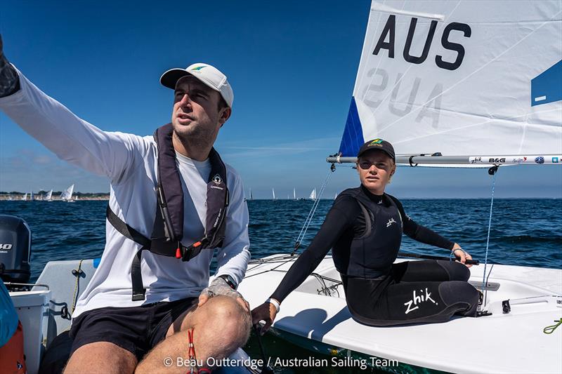 Mara Stransky (ILCA 6) talking with Ben Walkemeyer (Coach) while competing at Kieler Woche in Kiel, Germany. photo copyright by Beau Outteridge / Australian Sailing Team taken at  and featuring the ILCA 6 class