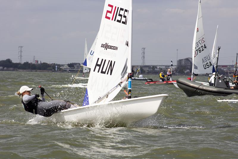 2022 ILCA 6 Women's & Men's World Championships at Kemah, Texas, USA day 1 photo copyright Helen Galli Photography / 2022ilca6.ilca-worlds.org/photos/  taken at Texas Corinthian Yacht Club and featuring the ILCA 6 class