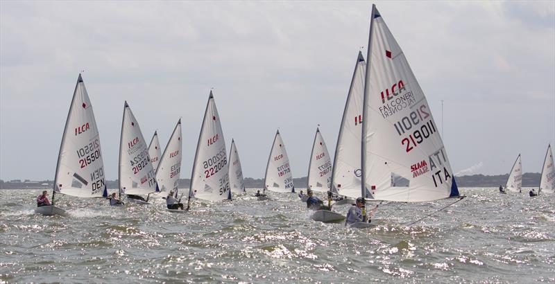 2022 ILCA 6 Women's & Men's World Championships at Kemah, Texas, USA day 1 photo copyright Helen Galli Photography / 2022ilca6.ilca-worlds.org/photos/  taken at Texas Corinthian Yacht Club and featuring the ILCA 6 class