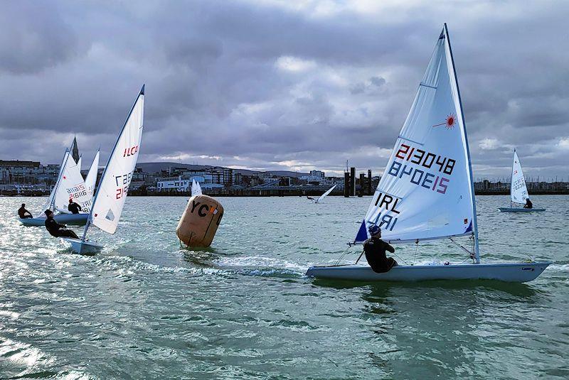 Conor Clancy leads a group of ILCA 6s - Viking Marine DMYC Frostbite Series 2 - photo © Ian Cutliffe