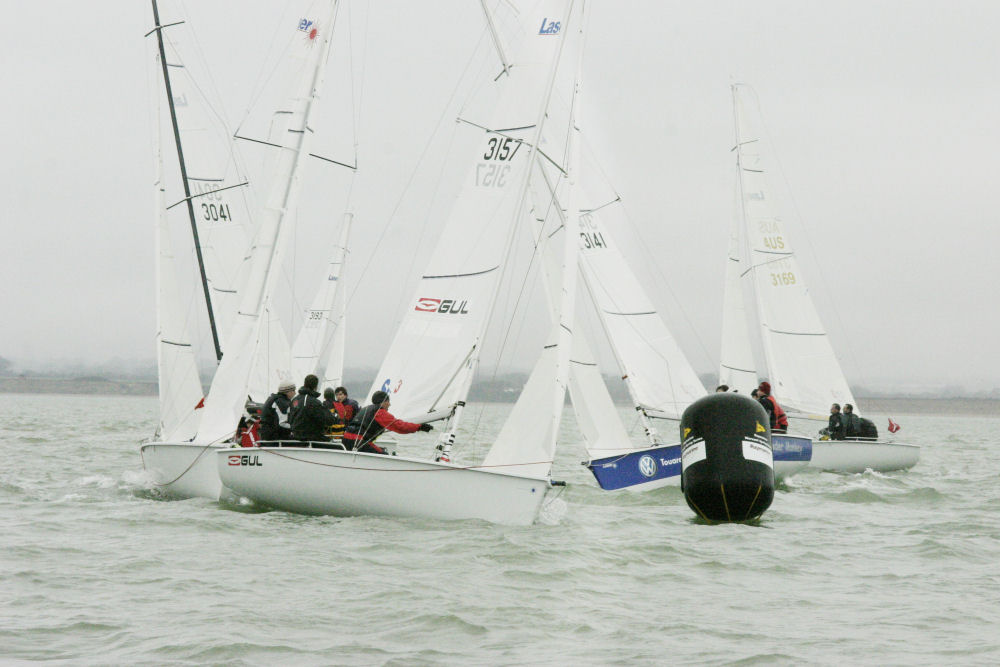 Mike Budd leads race 2 on week 3 of the Raymarine Warsash Spring Series photo copyright Eddie Mays taken at Warsash Sailing Club and featuring the SB20 class