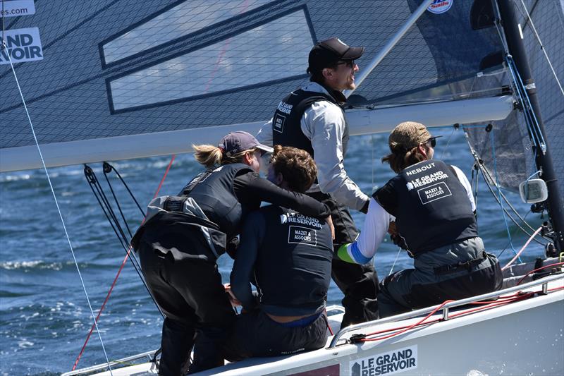 The winning skipper gets a hug from the one girl in the French crew - photo © Jane Austin