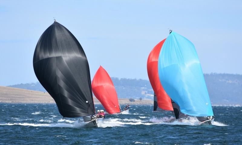 SB20 surfing downwind on the River Derwent in their Tasmanian Championship photo copyright Steve Catchpool taken at Bellerive Yacht Club and featuring the SB20 class