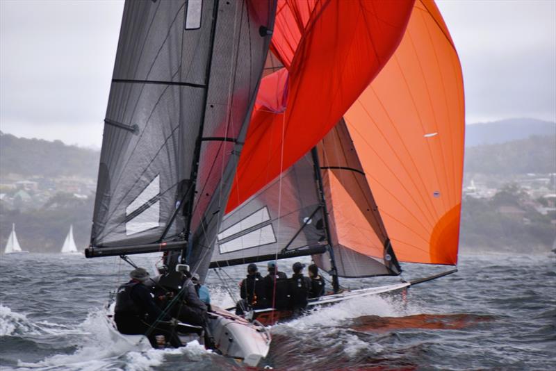 Nick Rogers (Karabos) chasing down Will Sargent (Ares Racing) on the River Derwent in Hobart photo copyright Jane Austin taken at Bellerive Yacht Club and featuring the SB20 class