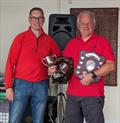 Champion Simon Hopkins receives his trophies from Commodore Dave Watkins during the Noble Marine Lightning 368 2023 Nationals at Chase SC