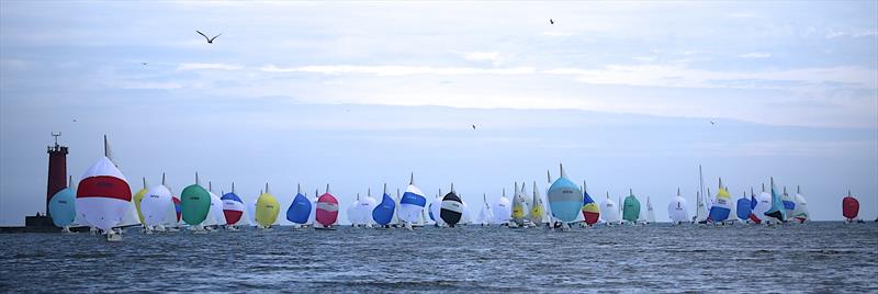 Spinnakers light-up the horizon at the 2014 Lightning North American Championship, hosted by Sail Sheboygan - photo © Image courtesy of Chris Gribble
