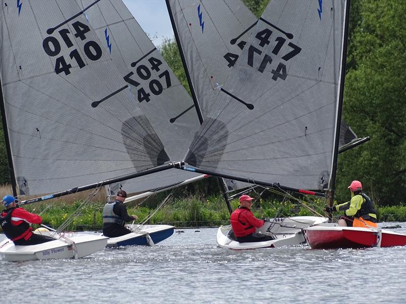 Bryan Westley ahead of a gaggle of chasing boats during the Sutton-in-Ashfield Lightning 368 Open photo copyright Caroline Hollier taken at  and featuring the Lightning 368 class