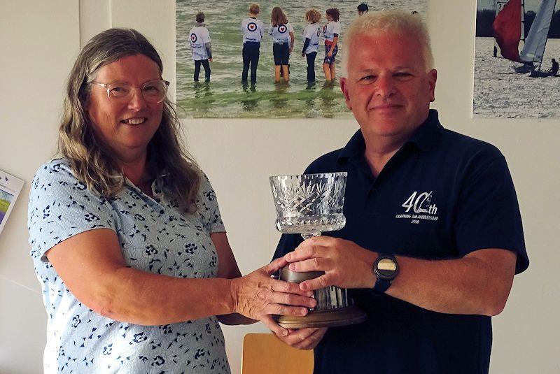 Winner Simon Hopkins receives the trophy - Lightning 368 Inland Championship at Oxford photo copyright John Butler taken at Oxford Sailing Club and featuring the Lightning 368 class