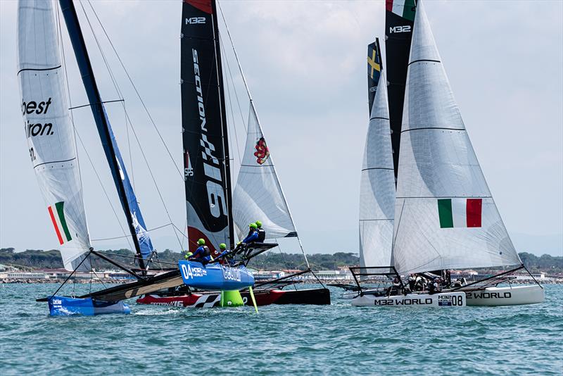 Andrea Lacorte's Vitamina Veloce leads the mid-fleet on to the run Pisa - 2019 Cetilar M32 European Series Pisa photo copyright Drew Malcolm taken at  and featuring the M32 class