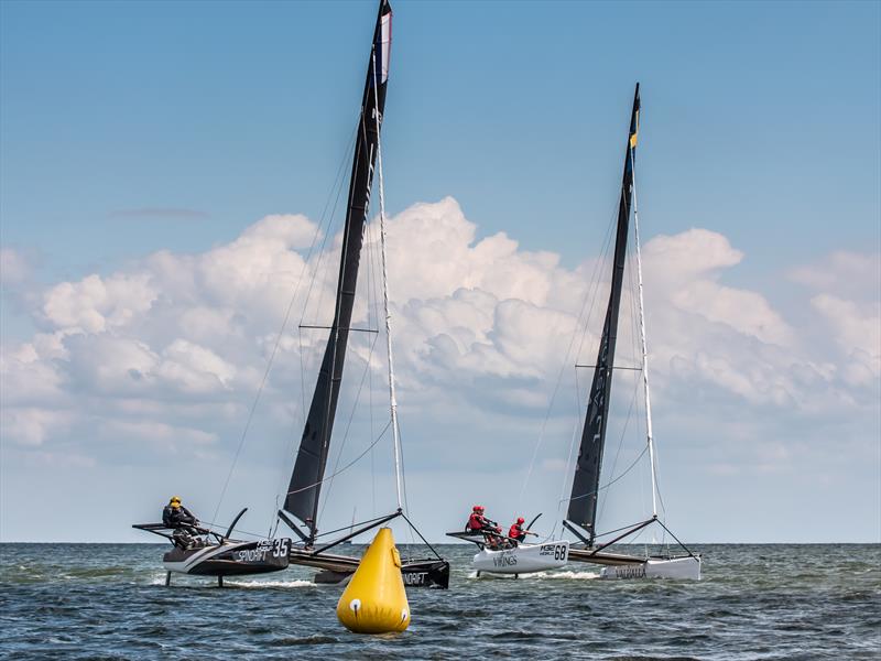 Spindrift racing leads Cape Crow Vikings into the top mark. - Day 1 - M32 European Series Holland photo copyright Hartas Productions taken at  and featuring the M32 class