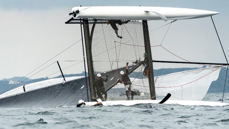 Richard Göransson's Inga from Sweden capsized in a gust during the final race, but was righted and back racing in two minutes. - M32 European Series Marstrand 2019 photo copyright Drew Malcolm / M32 World taken at  and featuring the M32 class
