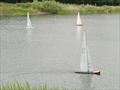 Roger Stollery 117 approches the finish in race 15, with Nigel barrow 31 beyond - Marblehead GAMES 5 event and Halfpenny Trophy at Abbey Meads © Martin Crysell
