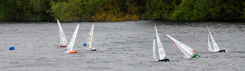 2021 M&S District Marblehead Championship - GAMES 5: a strong gust approaching the gate pushes rudders up out of the water with young Oliver 117 in 2nd chasing Phil 66 for the lead photo copyright Roger Stollery taken at Guildford Model Yacht Club and featuring the Marblehead class