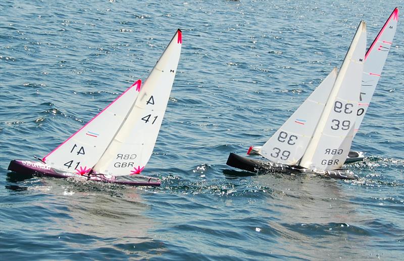 Rob 41 slips away from Peter 39 and Chris 70 at the start of Race 6 - Marblehead Nylet RM Challenge GAMES 6 at Littleton photo copyright Roger Stollery taken at Littleton Sailing Club and featuring the Marblehead class