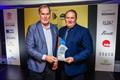 Wes Moxey, Riviera presented with a 2022 Australian Marine Industry Award by Steve Fisher, Rivergate Marina & Shipyard © Salty Dingo