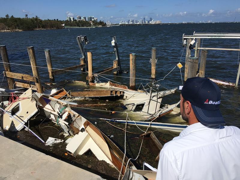 Learn what these guys know about how to protect a boat during a hurricane. Here a member of the BoatUS Catastrophe Team arranges for salvage of wrecked boats after hurricane Irma photo copyright Scott Croft taken at  and featuring the Marine Industry class