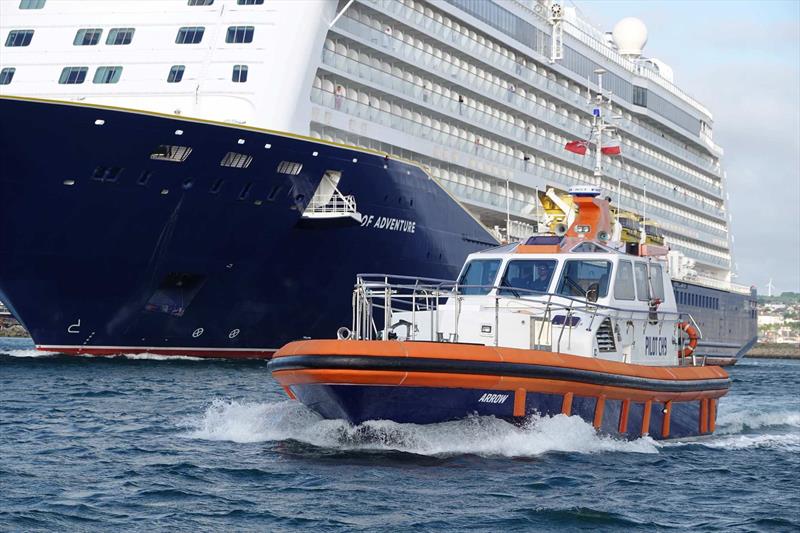 Abi and Ben aboard Falmouth Pilot Boat Arrow with cruise ship Spirit of Adventure - photo © Falmouth Harbour