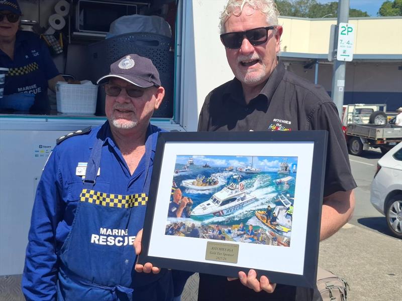 Marine Rescue Port Macquarie Unit Commander Greg Davies and Tim Walker - Community Development Manager Ritchies IGA photo copyright Marine Rescue NSW taken at  and featuring the Marine Industry class
