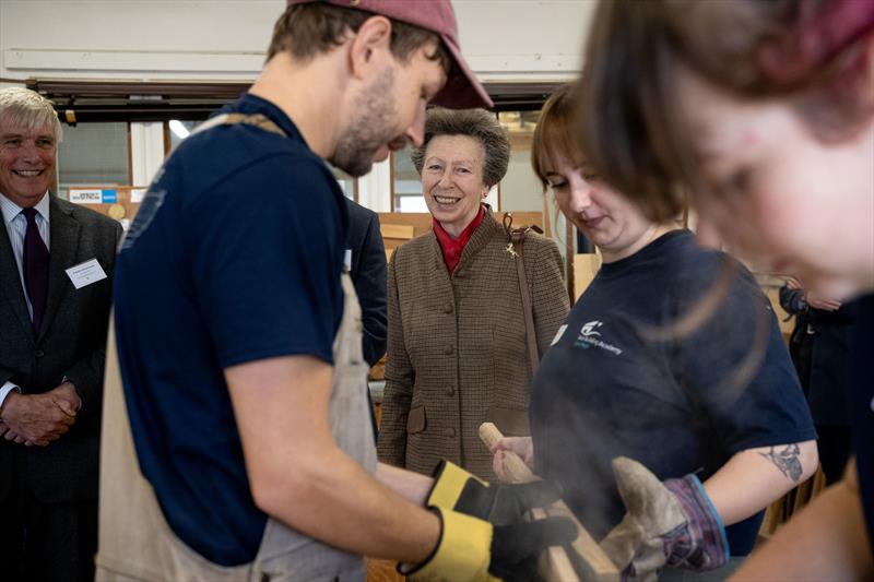 HRH The Princess Royal and Lord-Lieutenant of Dorset, Professor Michael Dooley watch a demonstration of steam bending at the Boat Building Academy in Lyme Regis photo copyright Philippa Gedge Photography taken at  and featuring the Marine Industry class