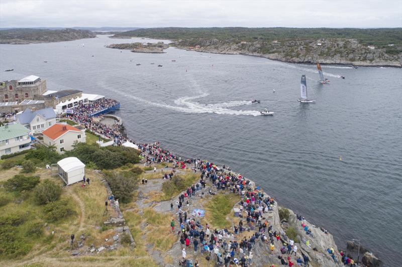 Phil Robertson, China One Ningbo (orange boat), vs Taylor Canfield, US One (grey boat) in the final of the GKSS Match Cup Sweden photo copyright Ian Roman / WMRT taken at Royal Gothenburg Yacht Club and featuring the Match Racing class