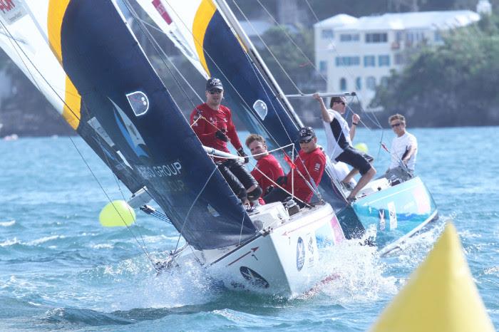 Swedish skipper Johnie Berntsson (right, in red shirt with cap) works hard to clear a windward mark during the 2015 Argo Group Gold Cup photo copyright Charles Anderson / RBYC taken at Royal Bermuda Yacht Club and featuring the Match Racing class