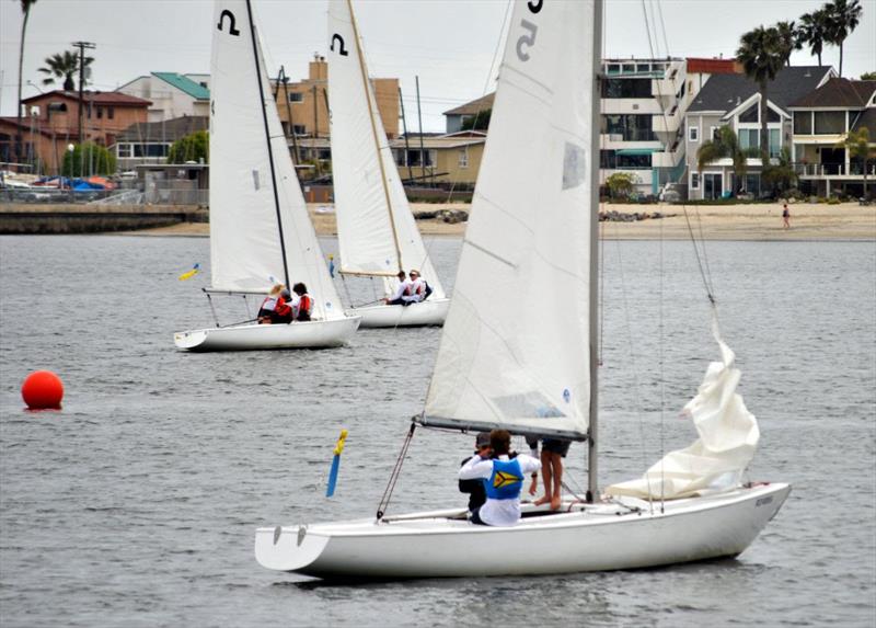 LBYC's Trent Turigliatto and crew (foreground) watch David Wood and Jeffrey Petersen of Balboa Yacht Club sail in the finals of the Junior Match Racing Invitational, hosted by LBYC. Photos by Laurie Morrison for LBYC photo copyright Laurie Morrison taken at Long Beach Yacht Club and featuring the Match Racing class