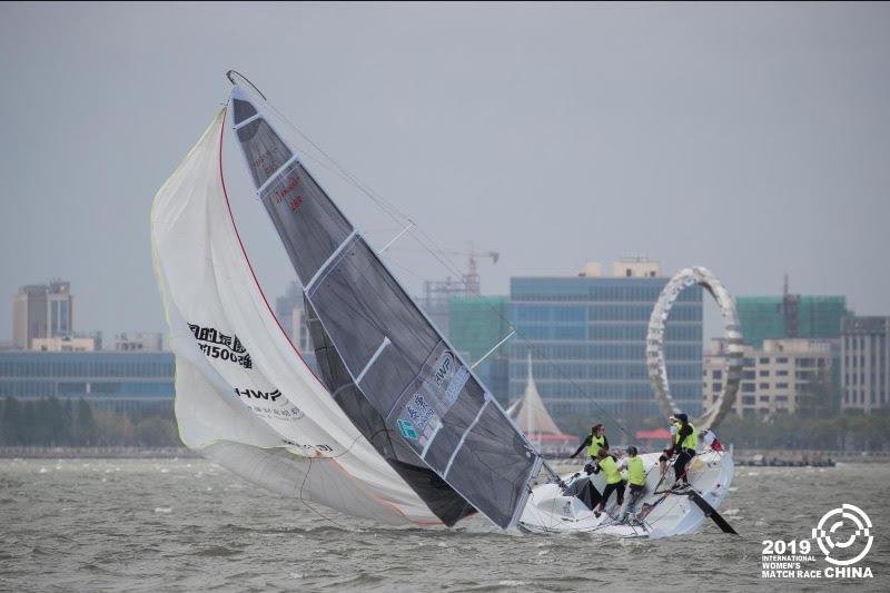 Ekaterina Chashchina (RUS) and her Seven Feet Team hang on in the blustery conditions to advance to the quarter-finals in Shanghai - 2019 China International Women's Match Race photo copyright CIWMR 2019 taken at  and featuring the Match Racing class
