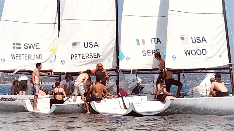 YMRWC teams rafted waiting for wind - Youth Match Racing Worlds 2021 photo copyright Greg Newman taken at Balboa Yacht Club and featuring the Match Racing class