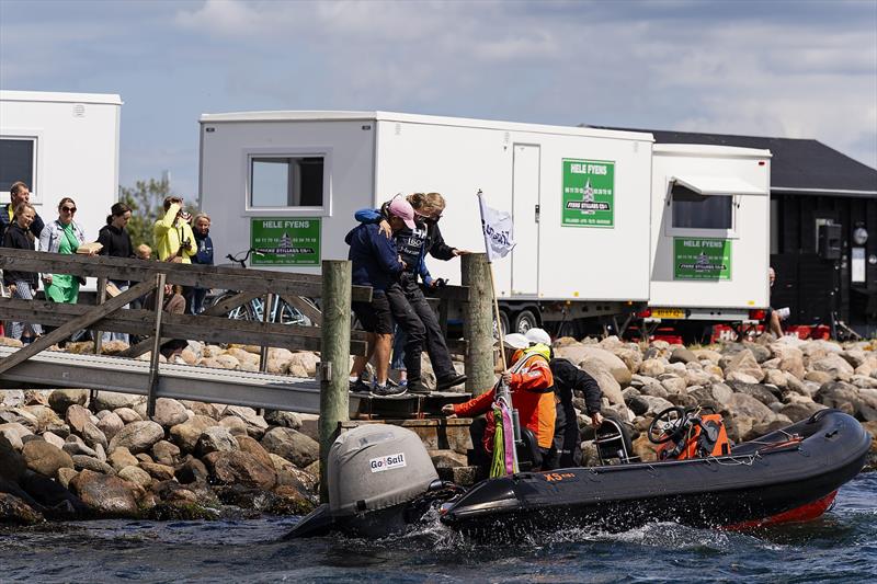 Liz Baylis and a volunteer assist Anna Östling getting back onto a RIB to re-start only moments after her injury on day 3 of the 2023 Women's Match Racing World Championship - powered by Bunker One - photo © Mick Anderson