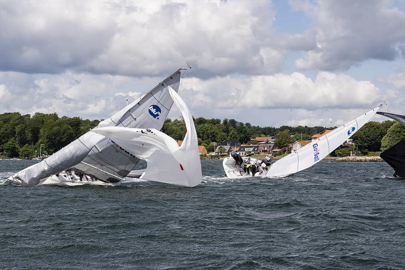 Anna Östling and Meghan Thomson crash after an intense fight on day 3 of the 2023 Women's Match Racing World Championship - powered by Bunker One photo copyright Mick Anderson taken at Middelfart Sailing Club and featuring the Match Racing class