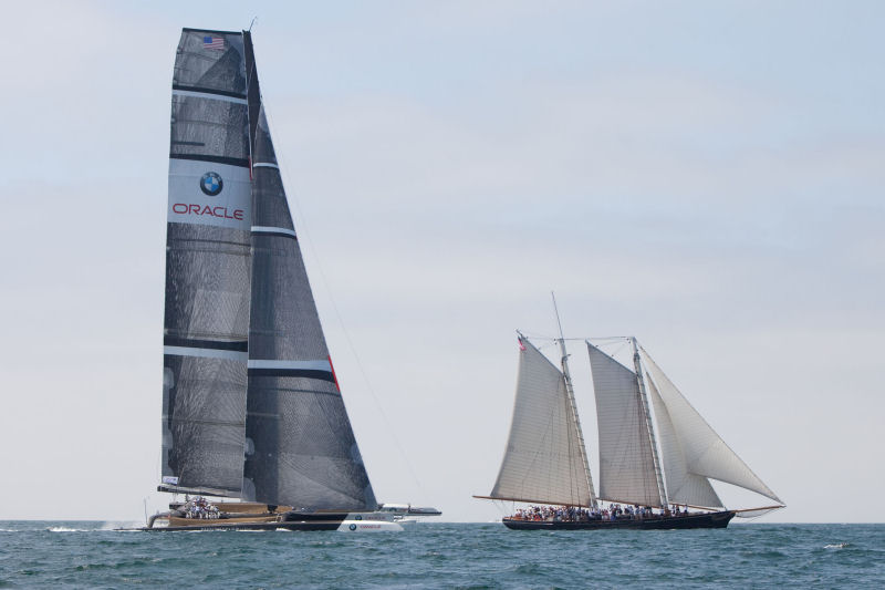 The BMW Oracle 90' trimaran and the replica of the 1851 America's Cup winner, the schooner America photo copyright Gilles Martin-Raget / BMW Oracle Racing taken at  and featuring the Maxi Cat class