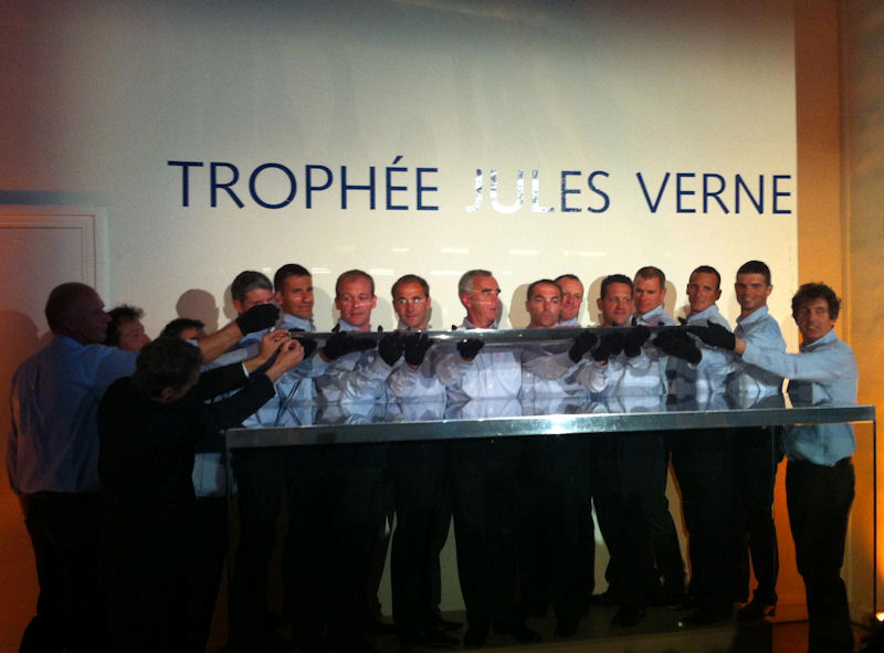 The crew of Banque Populaire V with the Jules Verne Trophy photo copyright Maxi Banque Populaire V taken at  and featuring the Maxi Cat class