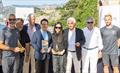 Lyra's Terry and Olivia Hui receive their prizes for winning the IMA Maxi European Championship and the trophy for the Best Placed IMA Member from the CRVI's Roberto Mottola and Maurizio Pavesi and IMA Secretary General Andrew McIrvine. 