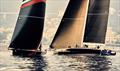 Close crossing within metres of the finish line between SHK Scallywag (left) and Magic Carpet E