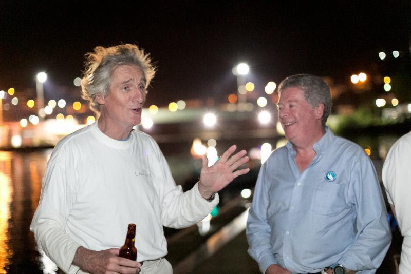 Mike Slade is greeted on the dock in Grenada by RORC Admiral and IMA Secretary General, Andrew McIrvine photo copyright RORC / Arthur Daniel taken at Royal Ocean Racing Club and featuring the Maxi class