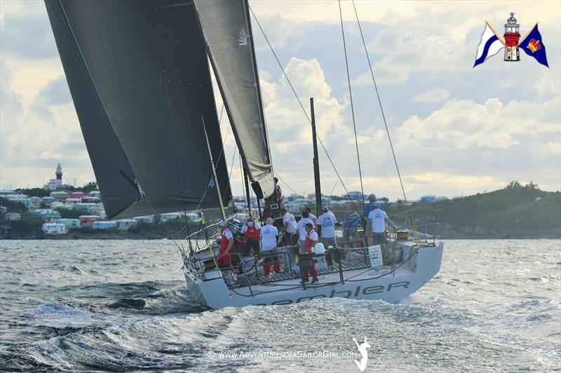 Rambler 88 approaches the finish at St. David's Lighthouse on Sunday evening to take line honours in the Newport Bermuda Race photo copyright Nic Douglass / www.AdventuresofaSailorGirl.com taken at Royal Bermuda Yacht Club and featuring the Maxi class