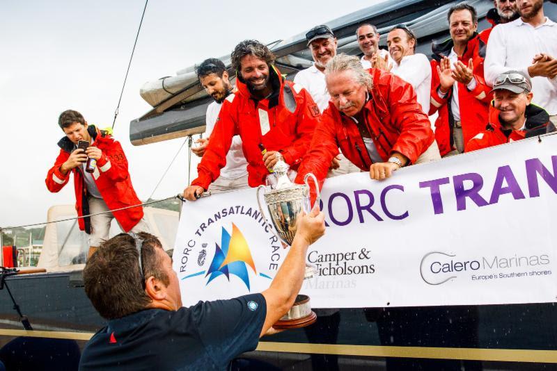 RORC Race Officer Steve Cole presents the IMA Trophy for Monohull Line Honours in the RORC Transatlantic Race - photo © RORC / Arthur Daniel