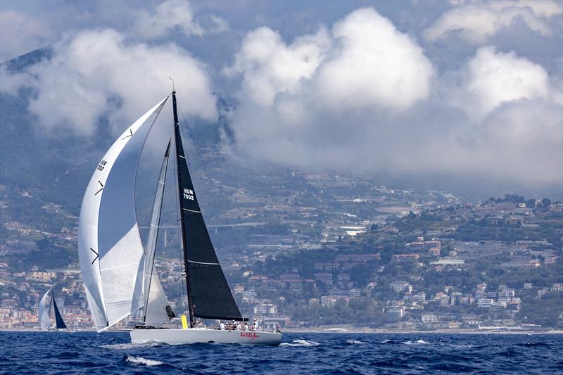 Low clouds over the coast, close by Márton Józsa's Wild Joe at the start of the Rolex Giraglia 2021 photo copyright IMA / Studio Borlenghi taken at Yacht Club Sanremo and featuring the Maxi class