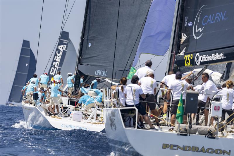 Alessandro del Bono's Reichel-Pugh 80 Capricorno leads Carlo Alberini's Davidson 69 Pendragon VI at the start of the Rolex Giraglia 2021 photo copyright IMA / Studio Borlenghi taken at Yacht Club Sanremo and featuring the Maxi class